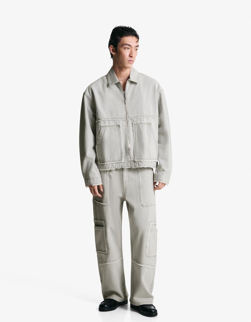 Giubbotto di jeans sfrangiato