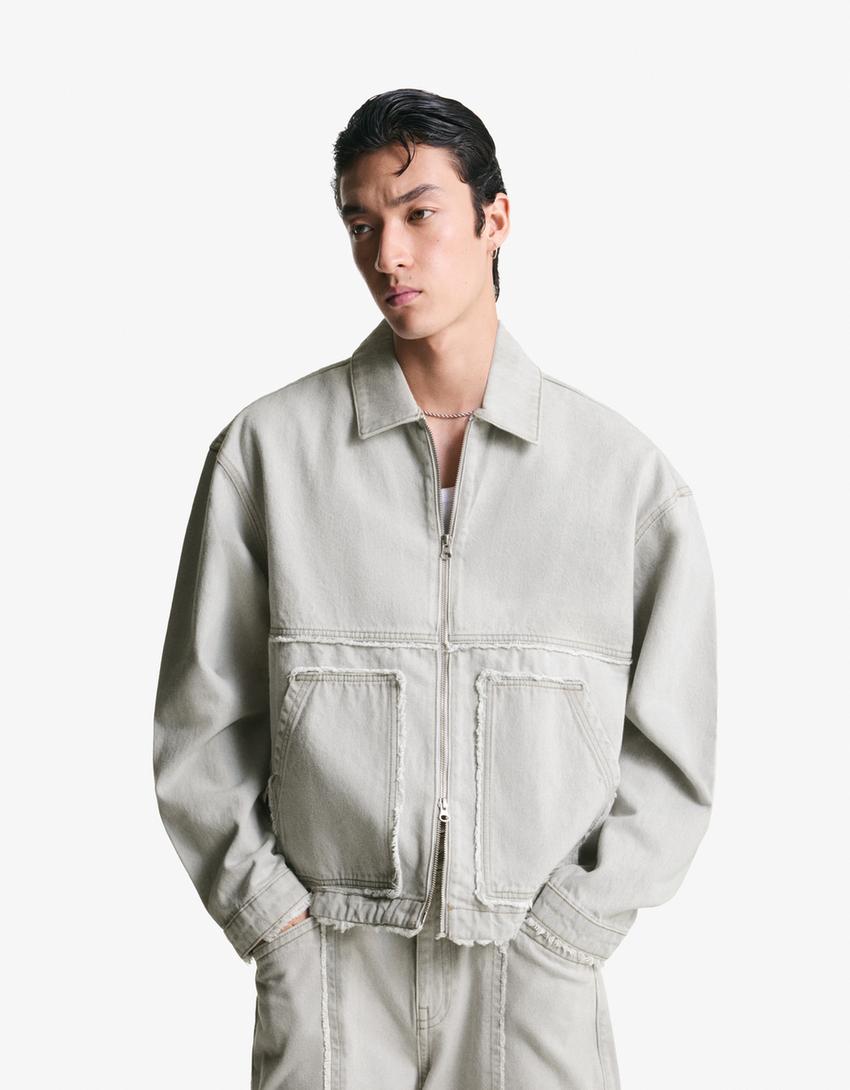 Giubbotto di jeans sfrangiato